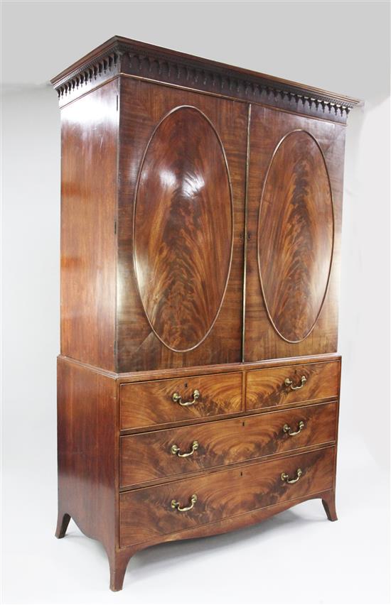 A George III mahogany linen press, H.7ft 3in.